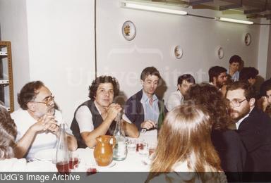 Grup de persones convidades durant l'àpat. [Photograph]